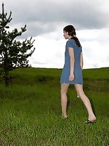 16 pictures - Spying on beautiful  teen peeing in the field