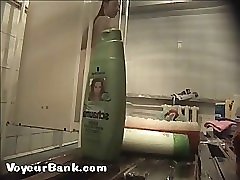 12 movies - Young slim doll getting spied after in the showers Part 1