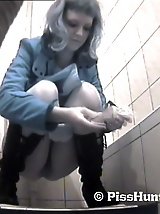 14 pictures - Blonde hottie pissing straight onto voyeur camera