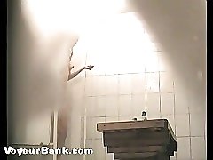 12 movies - Spying after a freshie shaving her pussy in shower Part 3