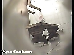 12 movies - Awesome voyeur shoot from the girls' shower room Part 1