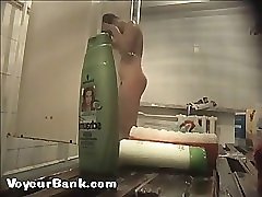 12 movies - Young slim doll getting spied after in the showers Part 3