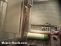 12 movies - Young slim doll getting spied after in the showers Part 1